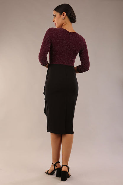 model is wearing diva catwalk contrast pencil dress with sleeve and asymmetric skirt detail in black and burgundy sparkle front