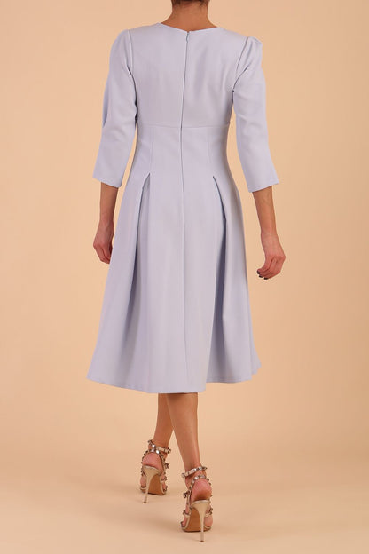 model is wearing diva catwalk harpsden a-line skirt 3/4 sleeve swing dress with rounded neckline in Celestial Blue front side