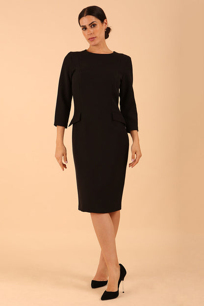 Model wearing back diva catwalk Elsinor 3/4 Sleeve pencil skirt dress with two side pockets in Black