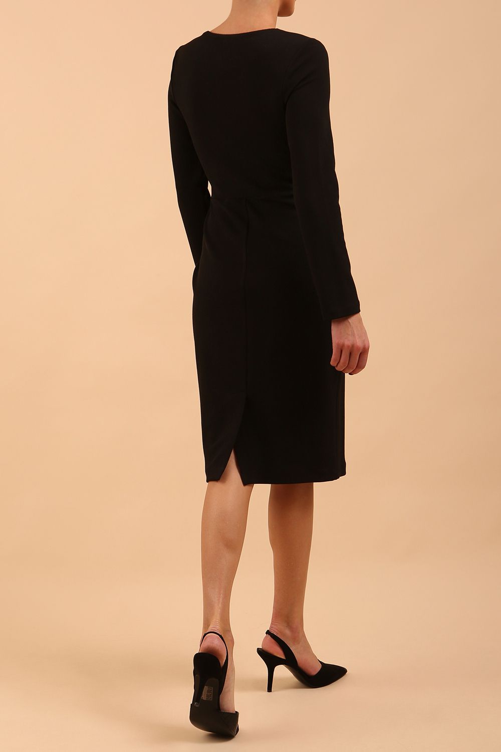 model is wearing diva catwalk gately pencil dress with long sleeves and twisted low v-neck in black front close up