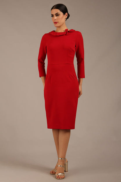 brunette model is wearing a diva catwalk  Helium 3/4 Sleeved Pencil Dress with 3/4 sleeve and knee length and bow detail on the neckline in dark red colour front close up