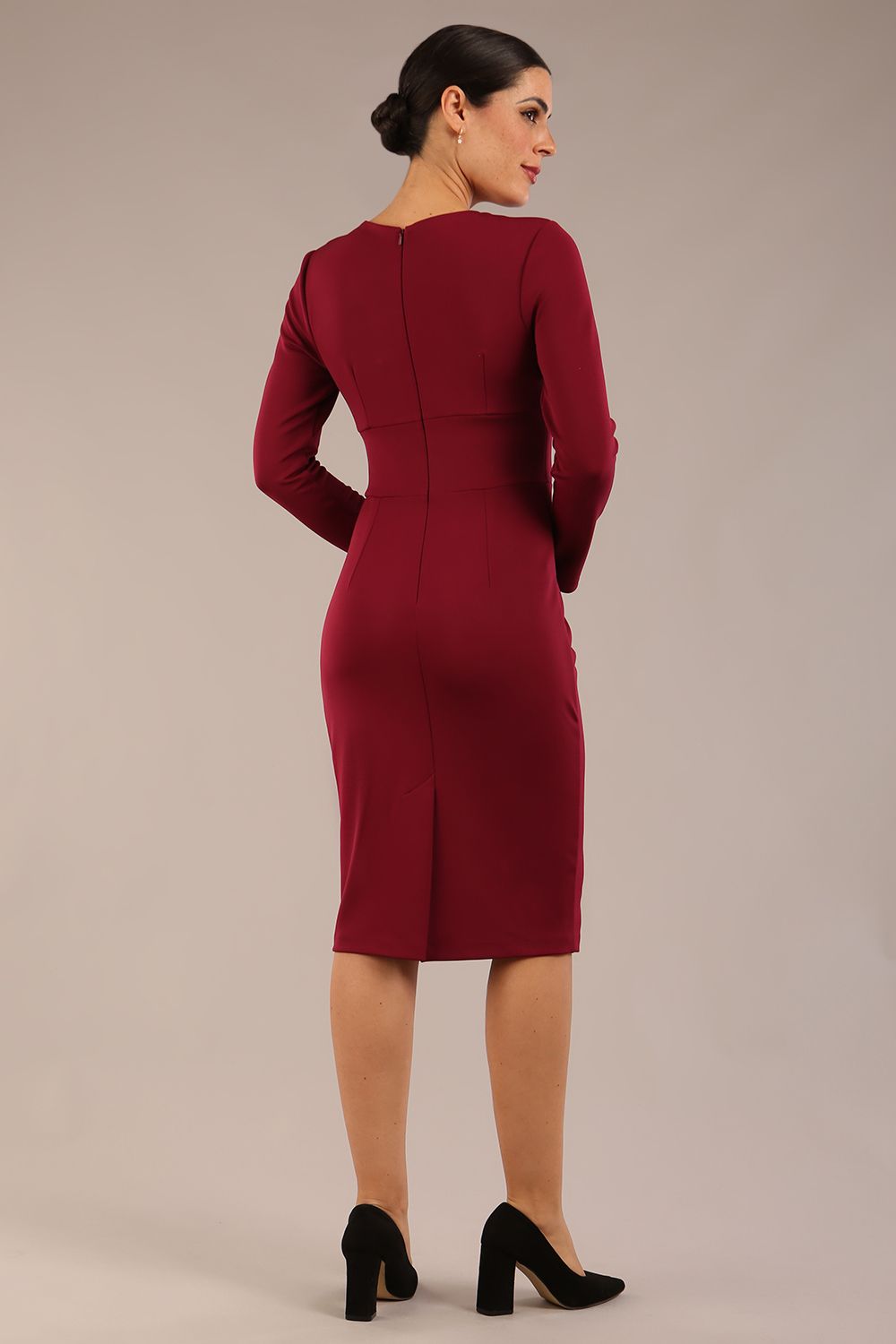 model wearing a diva catwalk Olgivy Long Sleeve Knee Length Pencil Dress round neckline and long sleeve in burgundy colour