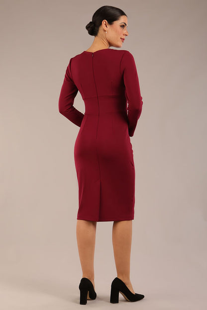 model wearing a diva catwalk Olgivy Long Sleeve Knee Length Pencil Dress round neckline and long sleeve in burgundy colour