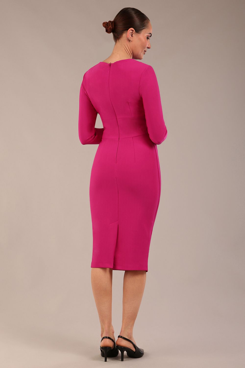 model wearing a diva catwalk Olgivy Long Sleeve Knee Length Pencil Dress round neckline and long sleeve in magenta colour