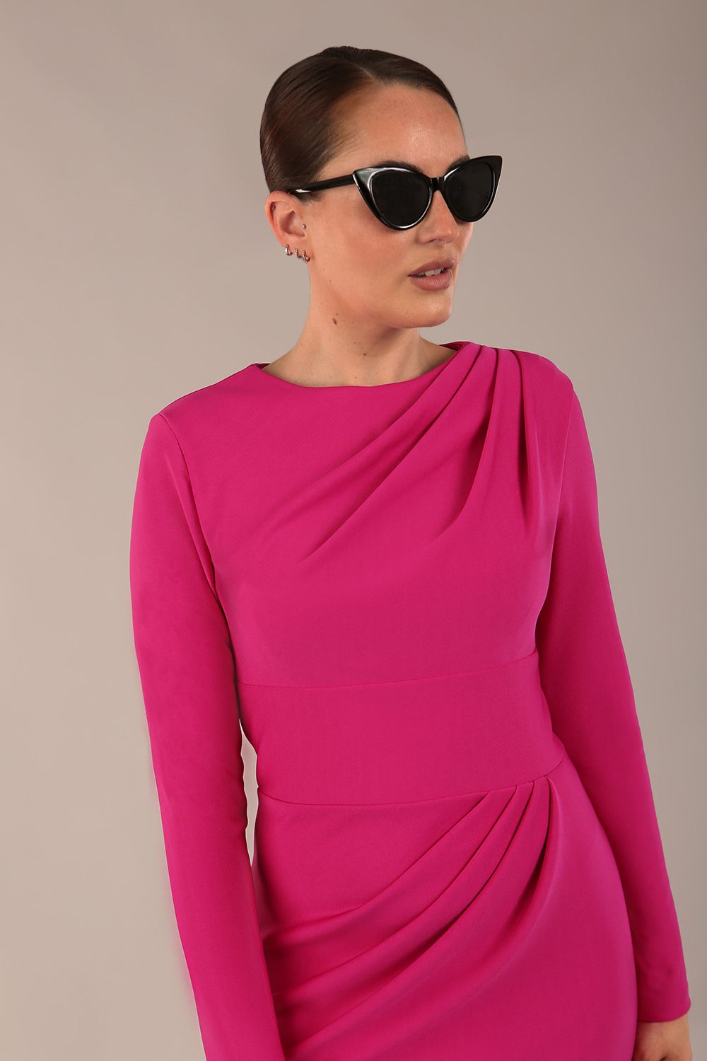 model wearing a diva catwalk Olgivy Long Sleeve Knee Length Pencil Dress round neckline and long sleeve in magenta colour