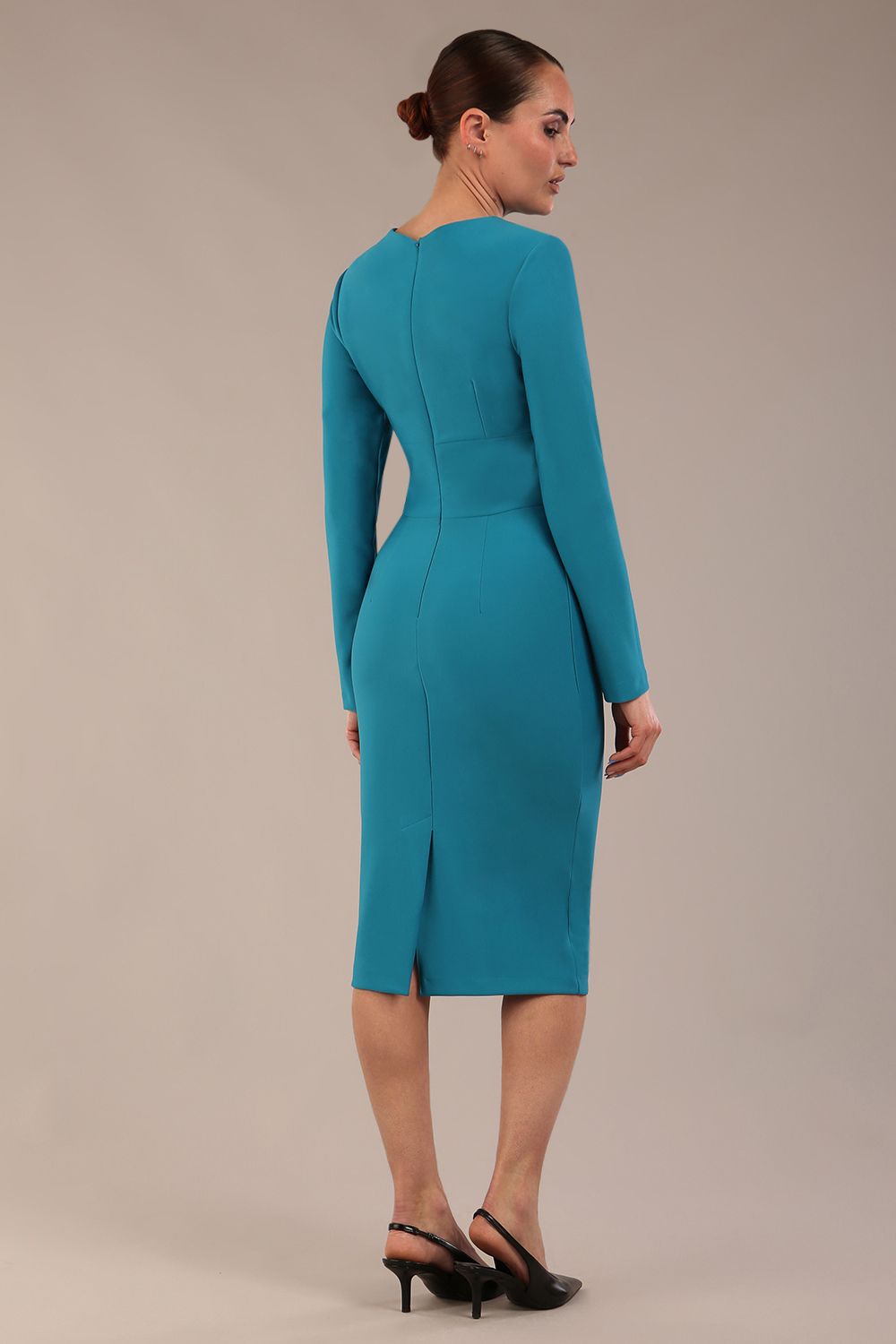 model wearing a diva catwalk Olgivy Long Sleeve Knee Length Pencil Dress round neckline and long sleeve in magic blue colour front