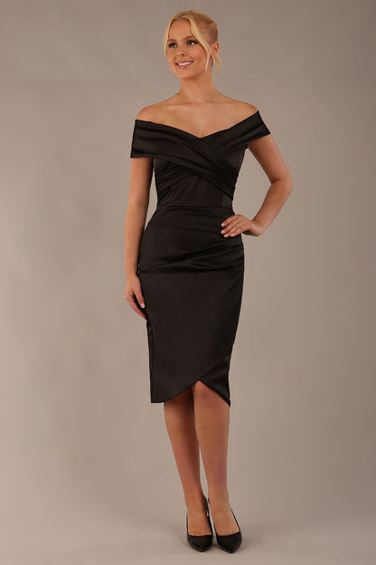 model is wearing diva catwalk casa blanca satin black pencil dress off shoulder design front (Black)
