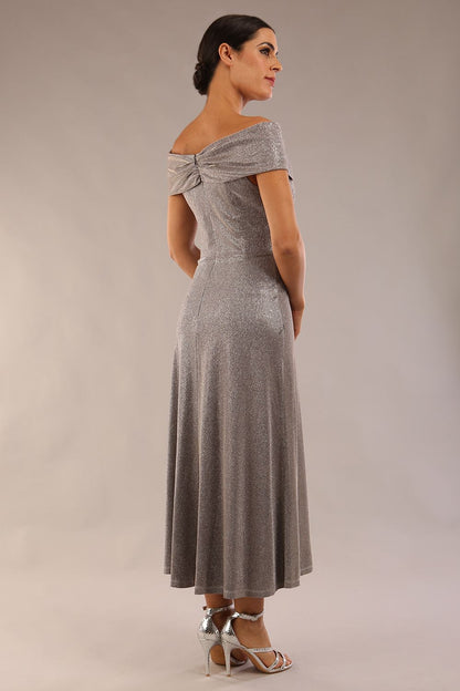 Model is wearing diva catwalk Capri A-Line Midaxi Glitter Dress off the shoulders in Iris Silver Glitter front