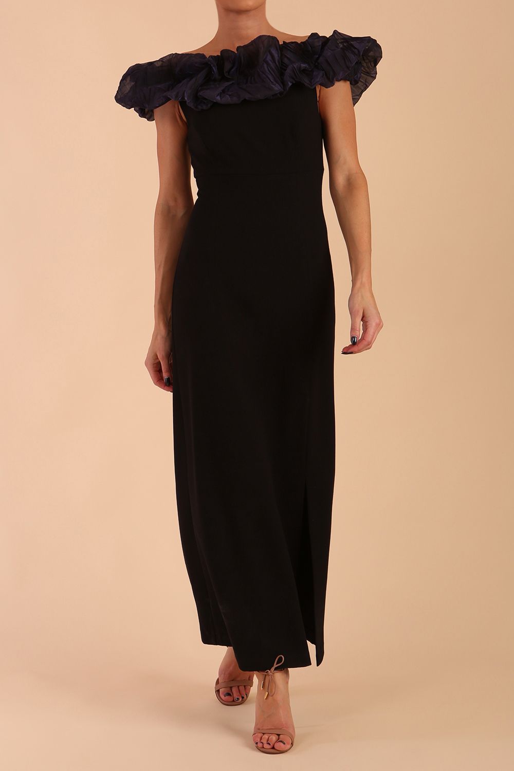 brunette model is wearing diva catwalk classique maxi black dress with off shoulder organza detail without sleeves in black and grey side