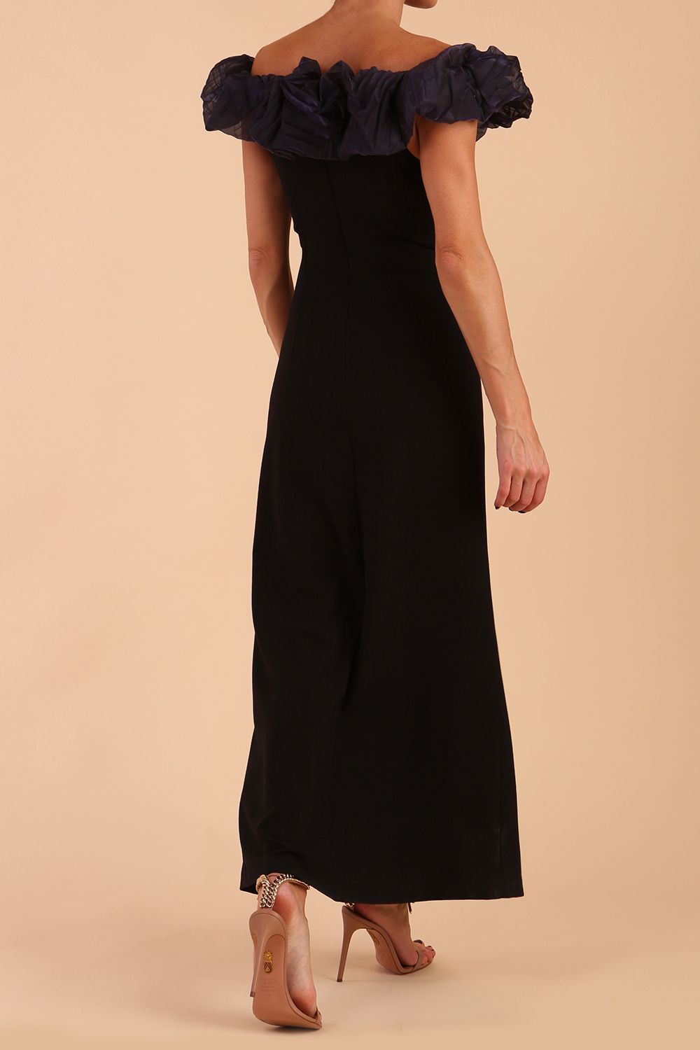 brunette model is wearing diva catwalk classique maxi black dress with off shoulder organza detail without sleeves in black and grey side