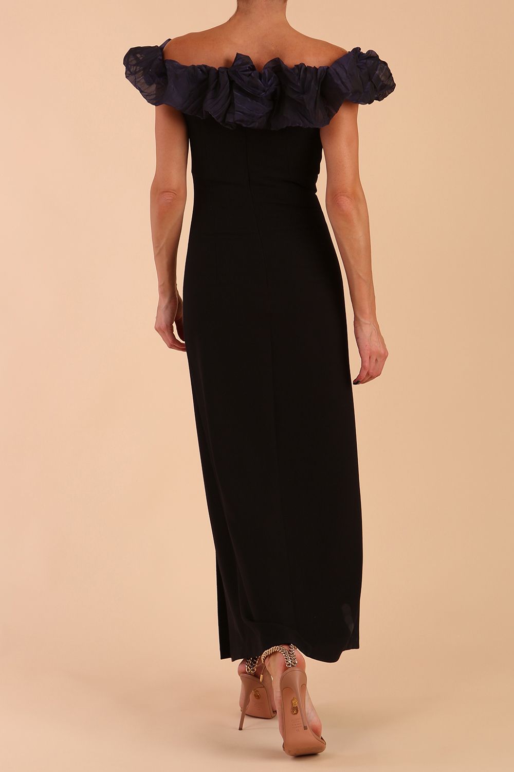 brunette model is wearing diva catwalk classique maxi black dress with off shoulder organza detail without sleeves in black and grey side