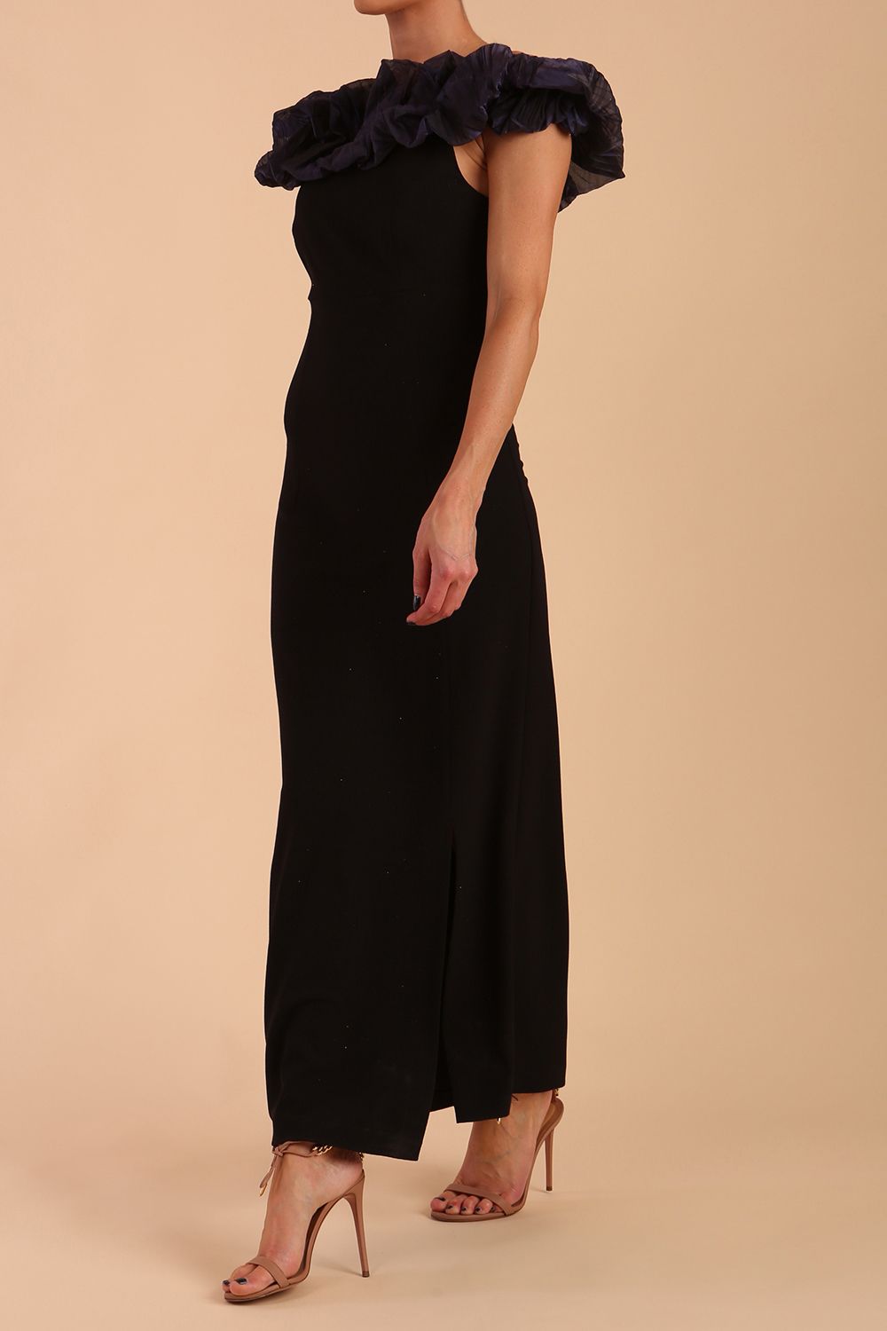 brunette model is wearing diva catwalk classique maxi black dress with off shoulder organza detail without sleeves in black and grey side