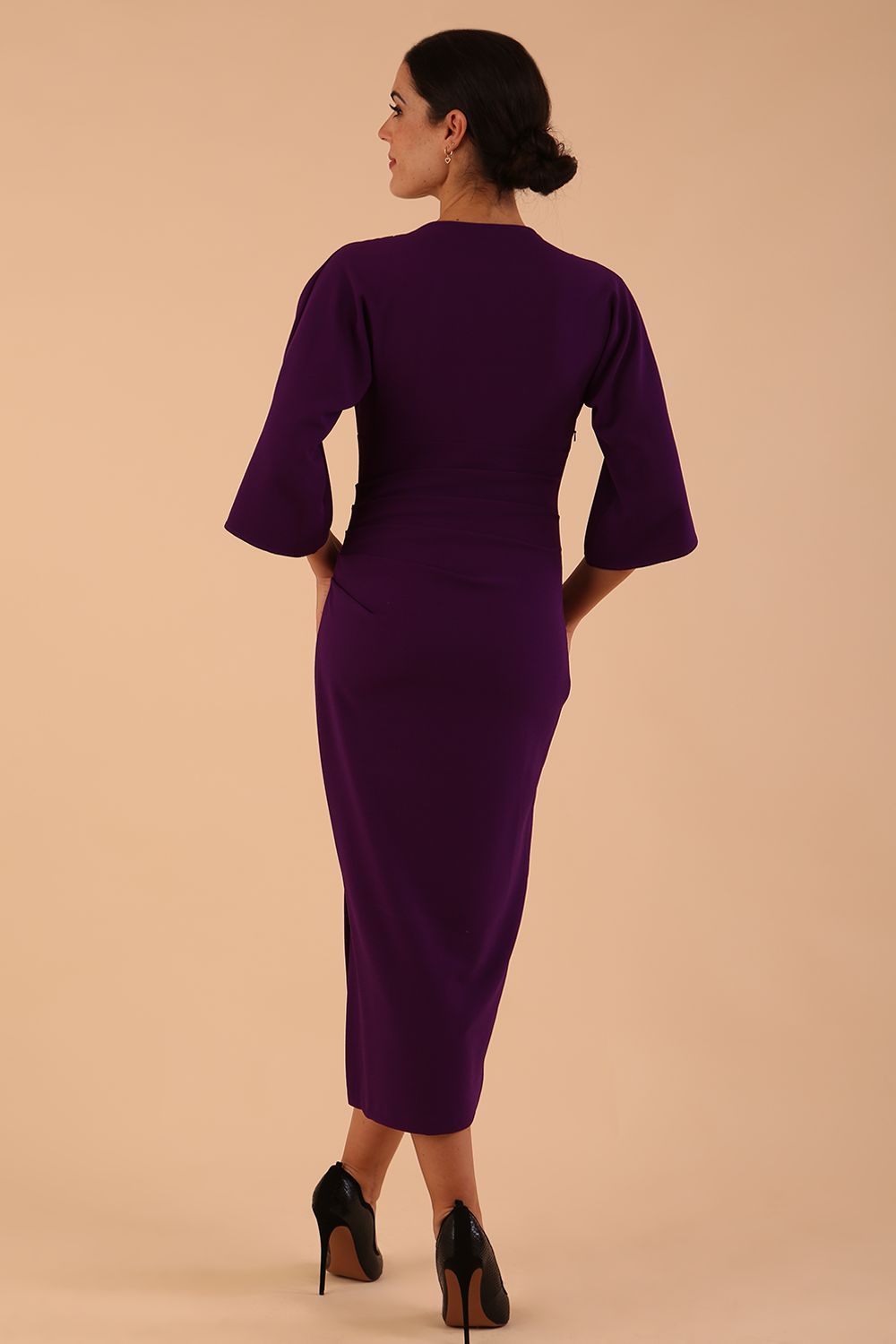 Model wearing diva catwalk Diana Cowl Neck pencil skirt dress in purple