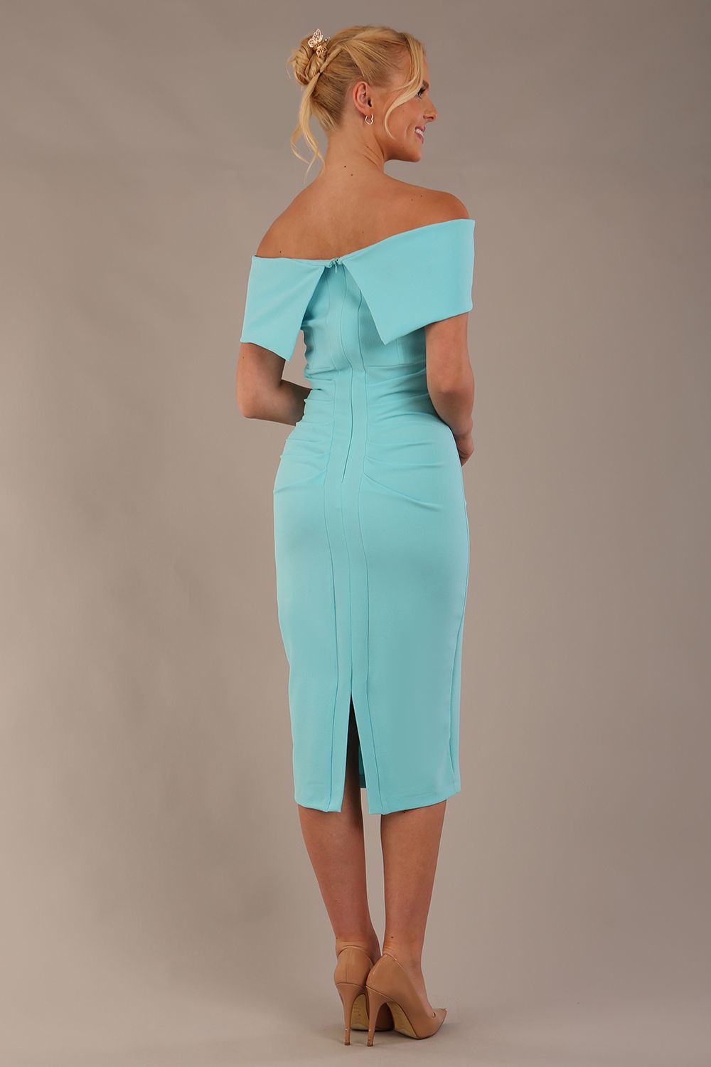 model is wearing diva catwalk amelia pencil dress with bardot neckline and ruched back in Turquoise (Turquoise)