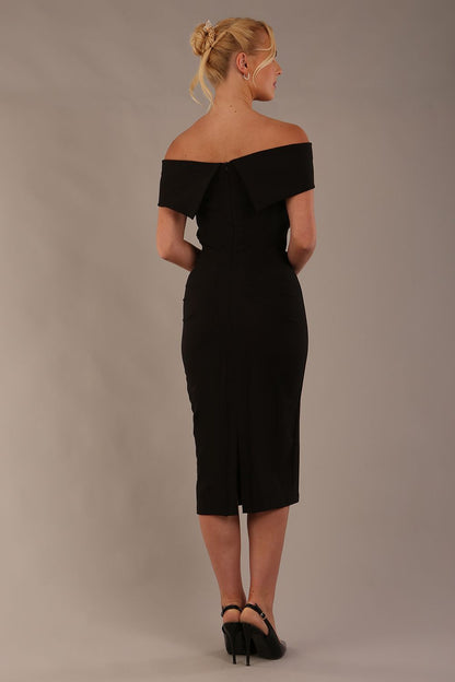 model is wearing diva catwalk amelia pencil dress with bardot neckline and ruched back in black front (Black)