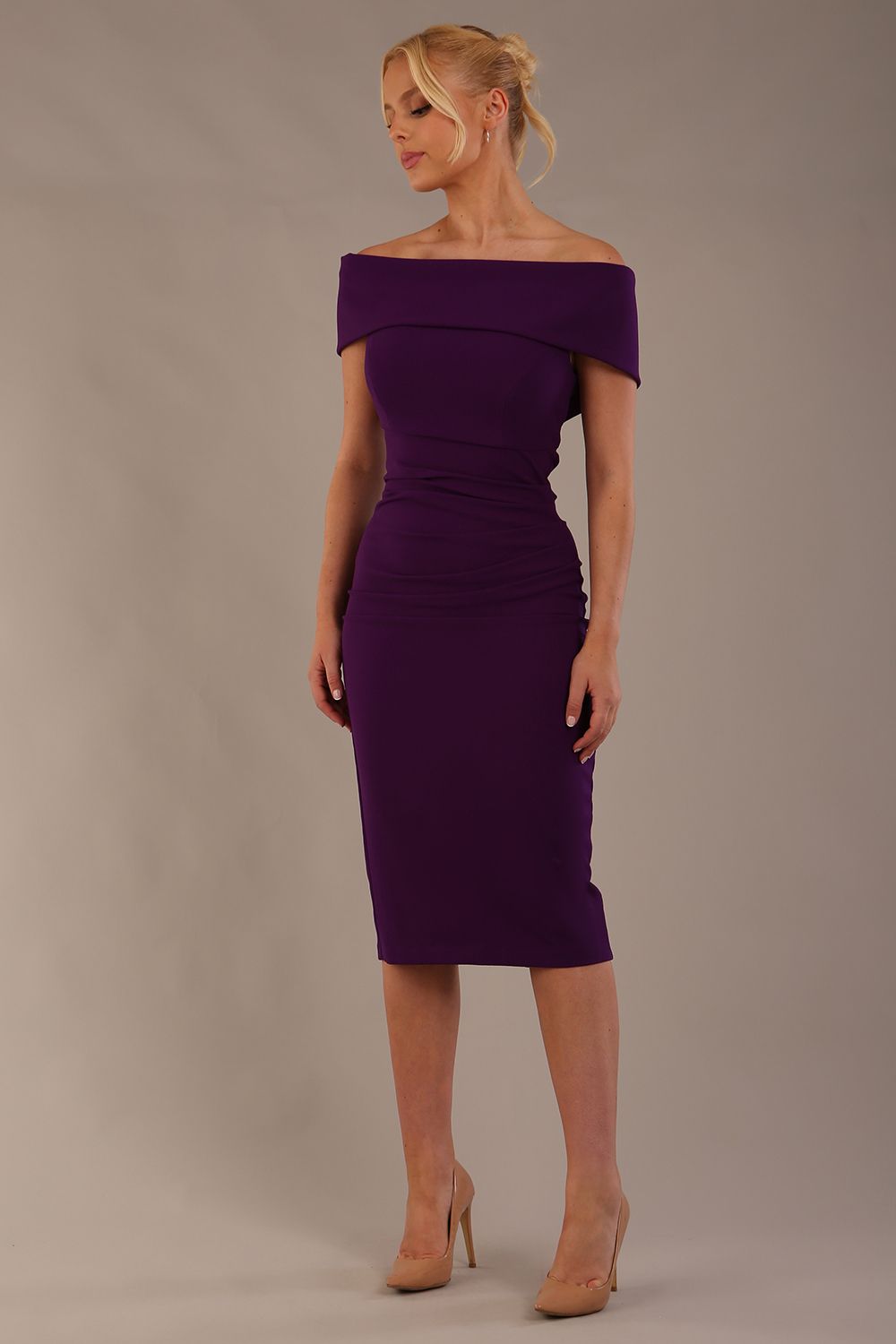 model is wearing diva catwalk amelia pencil dress with bardot neckline and ruched back in Passion Purple front (Passion Purple)