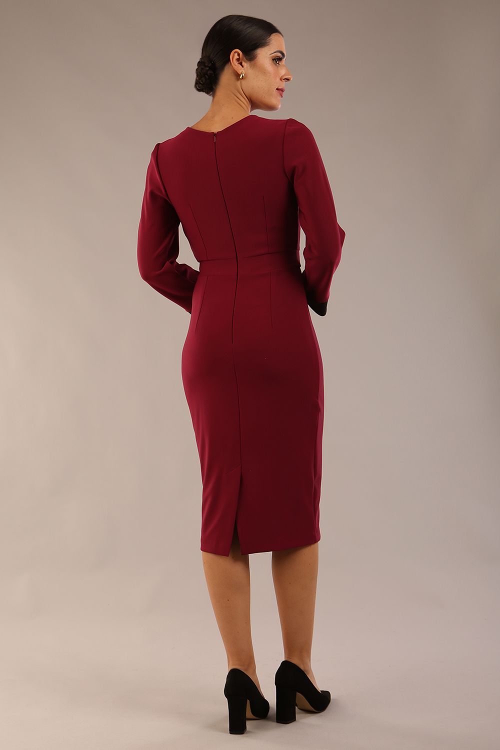 model is wearing diva catwalk bounty contrast pencil dress with rounded neckline and waistband in blissful burgundy and black colours front