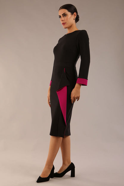 model is wearing diva catwalk bounty contrast pencil dress with rounded neckline and waistband in black and magenta haze colours front