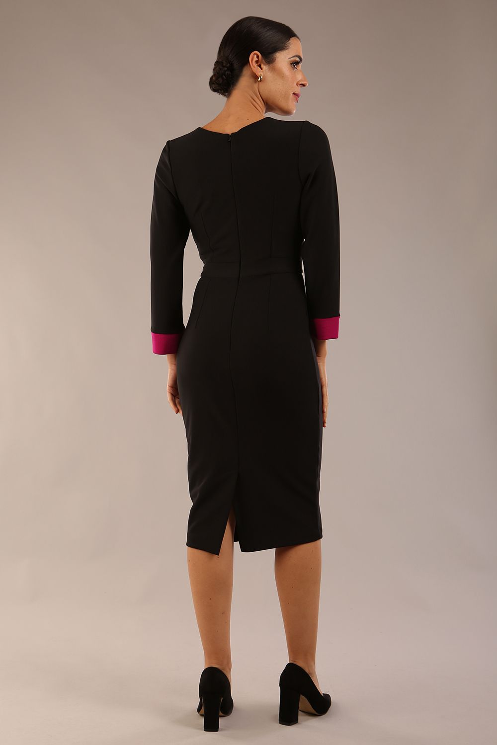 model is wearing diva catwalk bounty contrast pencil dress with rounded neckline and waistband in black and magenta haze colours front