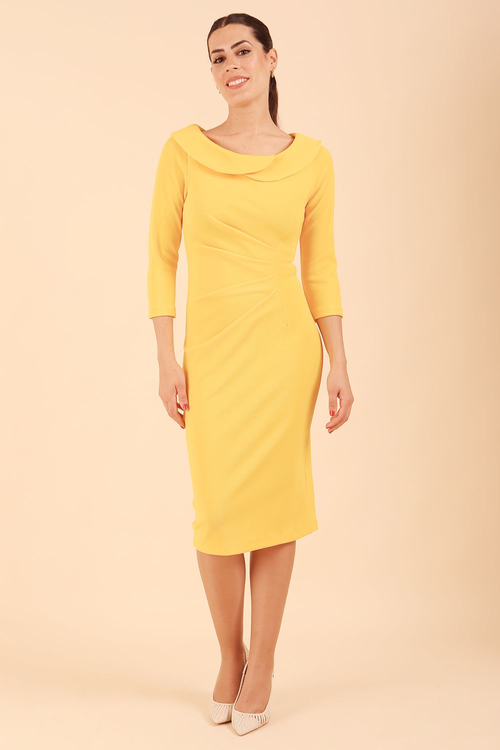Model wearing diva catwalk Monique 3/4 Sleeve Pencil Dress with Overlapping Folded Round Neckline and 3/4 sleeves and knee length in Sunshine Yellow front