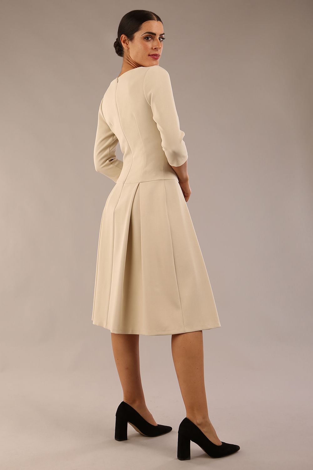 model is wearing a diva catwalk Cordelia Square Neck Pleated Midi A-line Dress with 3/4 sleeve in sandshell beige colour front