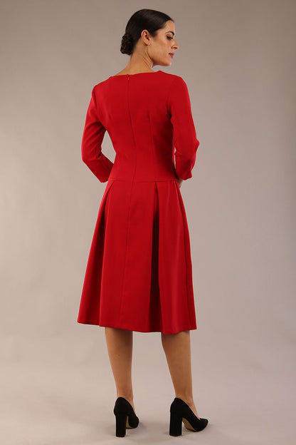 model is wearing a diva catwalk Cordelia Square Neck Pleated Midi A-line Dress with 3/4 sleeve in dark red colour front