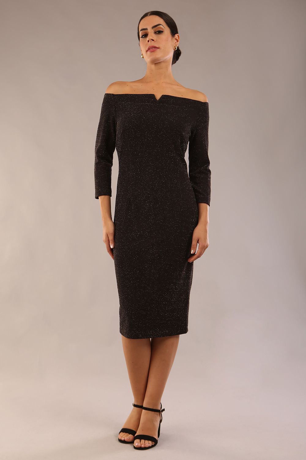 model is wearing a diva catwalk neptune pencil off-shoulder dress with 3/4 sleeve in black sparkle front