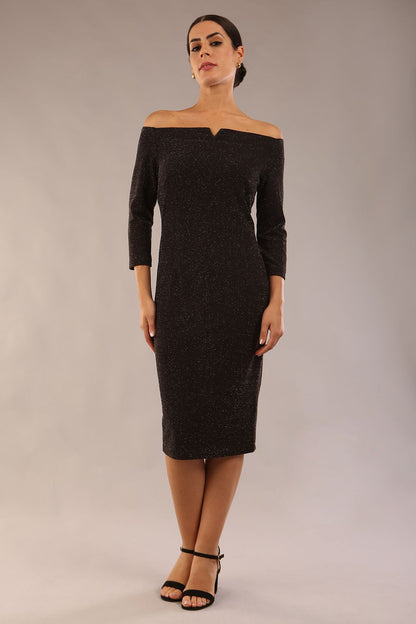 model is wearing a diva catwalk neptune pencil off-shoulder dress with 3/4 sleeve in black sparkle front