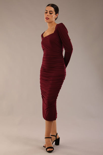 Model wearing diva catwalk Kiki Silky Stretch Ruched Midaxi Dress in Burgundy back