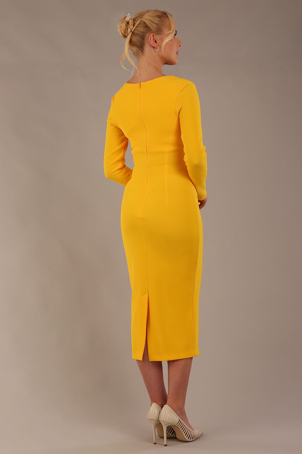 Model wearing diva catwalk Long Sleeved Lydia Midi pencil dress in Sunshine Yellow (Sunshine Yellow)