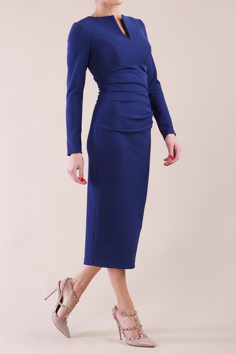 Model wearing diva catwalk Long Sleeved Lydia Midi pencil dress in Navy Blue