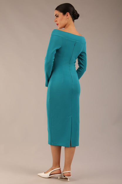 brunette Model is wearing a DIVA Catwalk Faye Off Shoulder Long Sleeve Midi Pencil Dress in Mosaic Blue colour front image