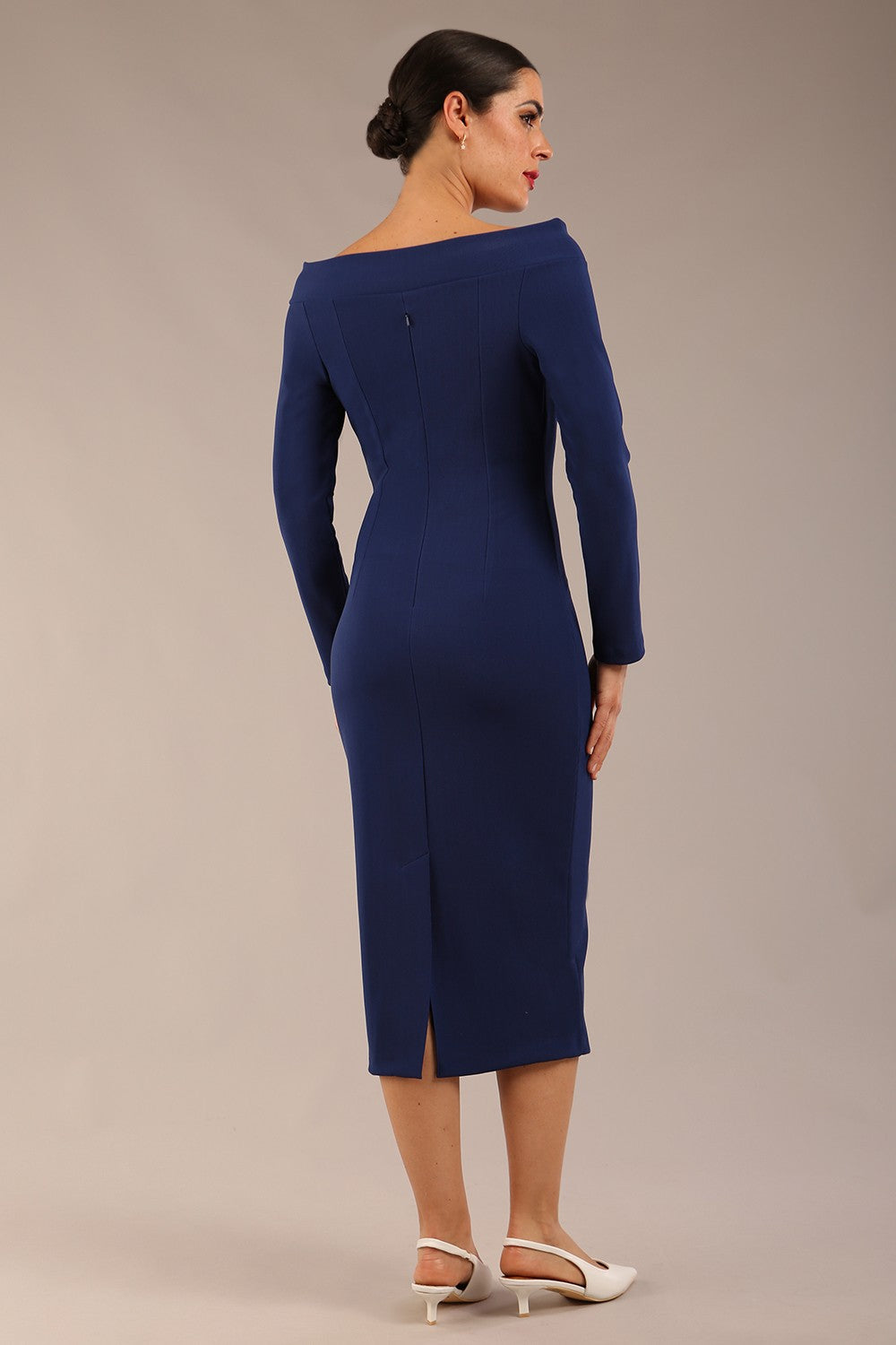 brunette Model is wearing a DIVA Catwalk Faye Off Shoulder Long Sleeve Midi Pencil Dress in Navy Blue colour front image
