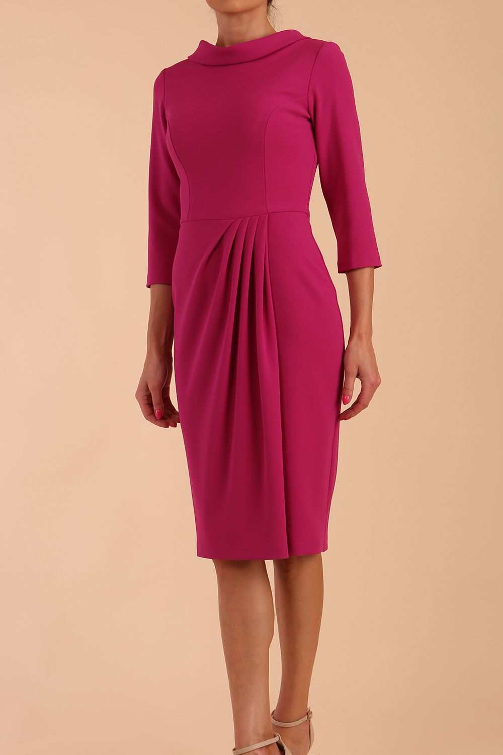 Model wearing diva catwalk Hazel pencil skirt dress with 3/4 sleeved in Magenta Haze side front