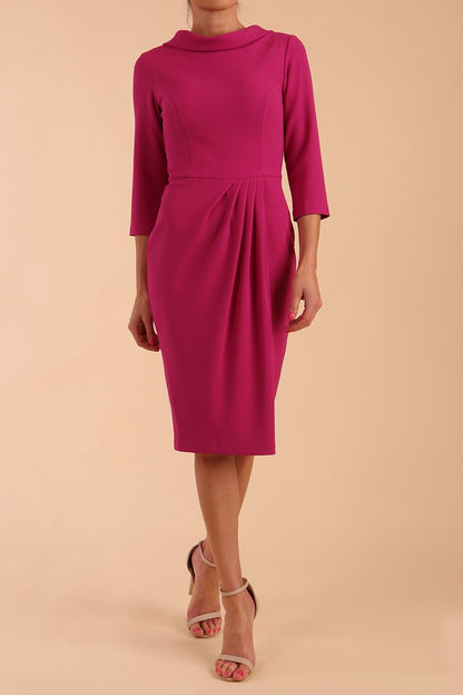 Model wearing diva catwalk Hazel pencil skirt dress with 3/4 sleeved in Magenta Haze side front