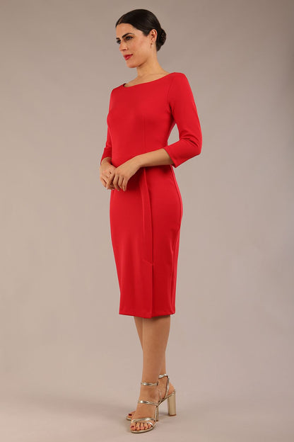 brunette Model wearing a diva catwalk Kinga 3/4 Sleeve pencil skirt dress with round neckline in Electric Red colour front side