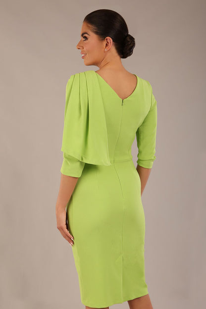 brunette model is wearing a diva catwalk Frieth Gathered Shoulder Dress 3/4 sleeves knee length with shoulder detail in paradise green colour back image close up