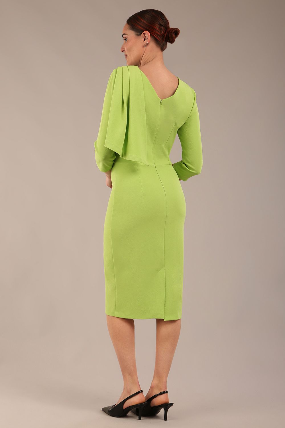 brunette model is wearing a diva catwalk Frieth Gathered Shoulder Dress 3/4 sleeves knee length with shoulder detail in paradise green colour back image close up