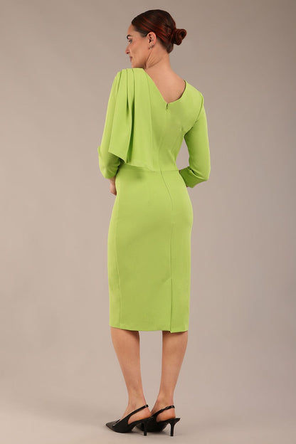 brunette model is wearing a diva catwalk Frieth Gathered Shoulder Dress 3/4 sleeves knee length with shoulder detail in paradise green colour back image close up
