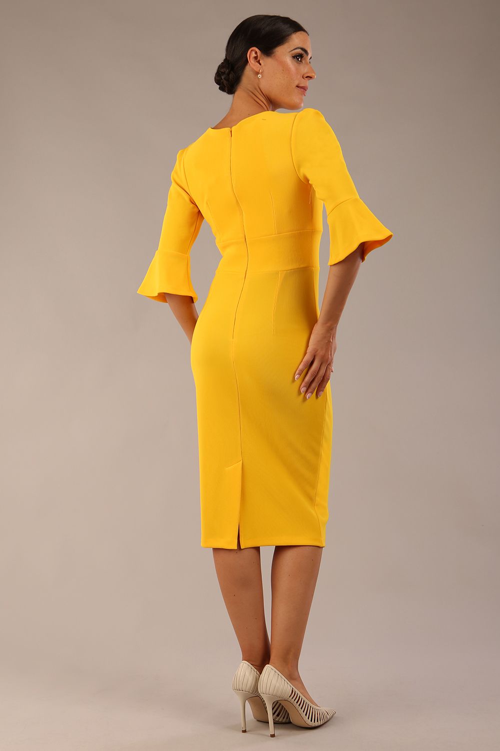Model wearing diva catwalk Santorini 3/4 Length Bell Sleeve Midi Pencil Dress in Sunshine Yellow front