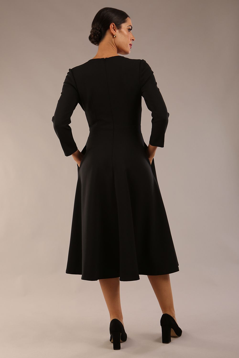 Model wearing diva catwalk Kate 3/4 Length Sleeve A-Line Swing Dress with pockets in Black front