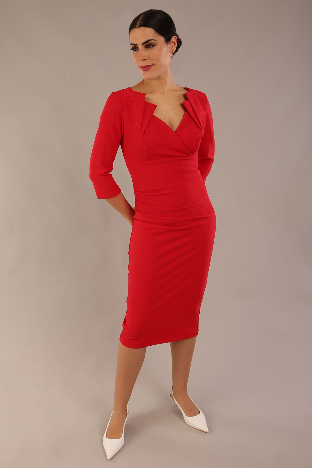 brunette model is wearing a diva catwalk Indira 3/4 Sleeve Knee Length Pencil Dress collar detail in electric red colour front close up