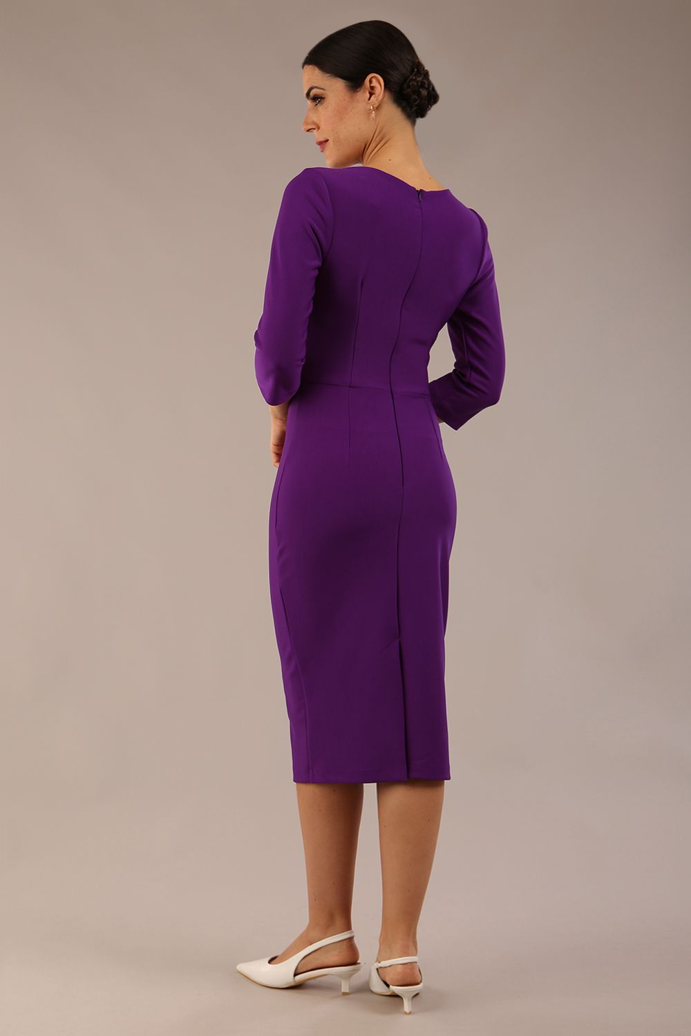 brunette model is wearing a diva catwalk Indira 3/4 Sleeve Knee Length Pencil Dress collar detail in passion purple colour front
