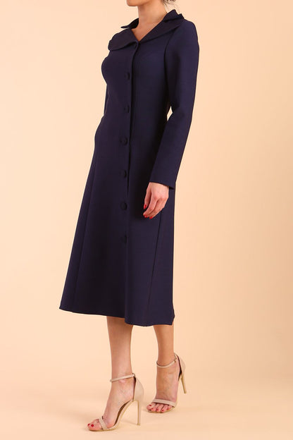 Model wearing diva catwalk Heston Long Sleeve Coat Dress in Navy Blue front