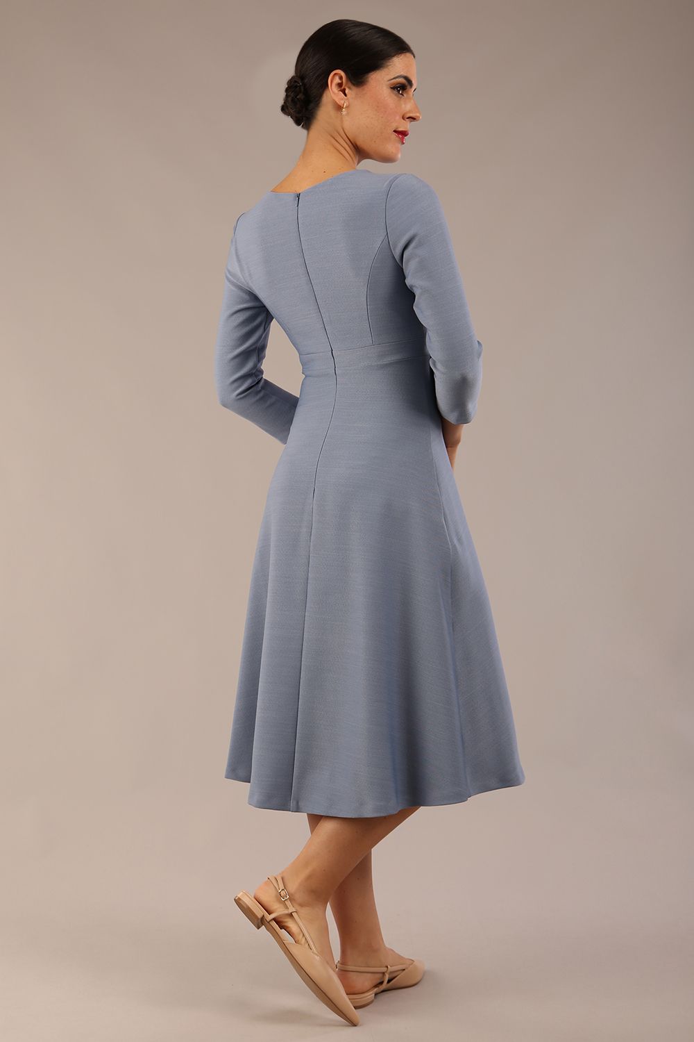 Model wearing diva catwalk Gresham 3/4 Sleeve Knee Length A-Line Dress in Steel Blue side front