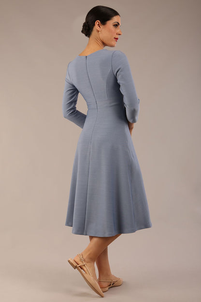 Model wearing diva catwalk Gresham 3/4 Sleeve Knee Length A-Line Dress in Steel Blue side front