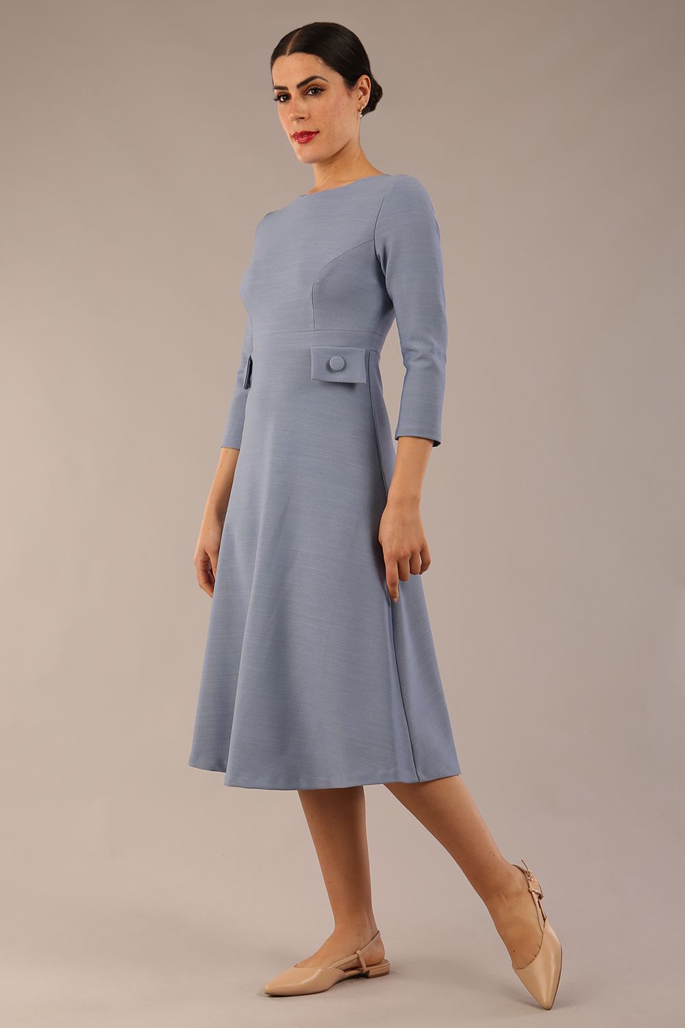 Model wearing diva catwalk Gresham 3/4 Sleeve Knee Length A-Line Dress in Steel Blue side front