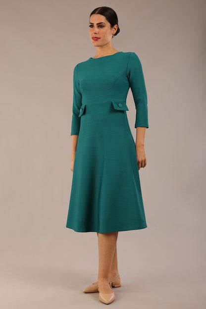 Model wearing diva catwalk Gresham 3/4 Sleeve Knee Length A-Line Dress in Pacific Green  front