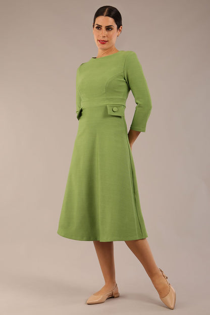 Model wearing diva catwalk Gresham 3/4 Sleeve Knee Length A-Line Dress in Citrus Green front