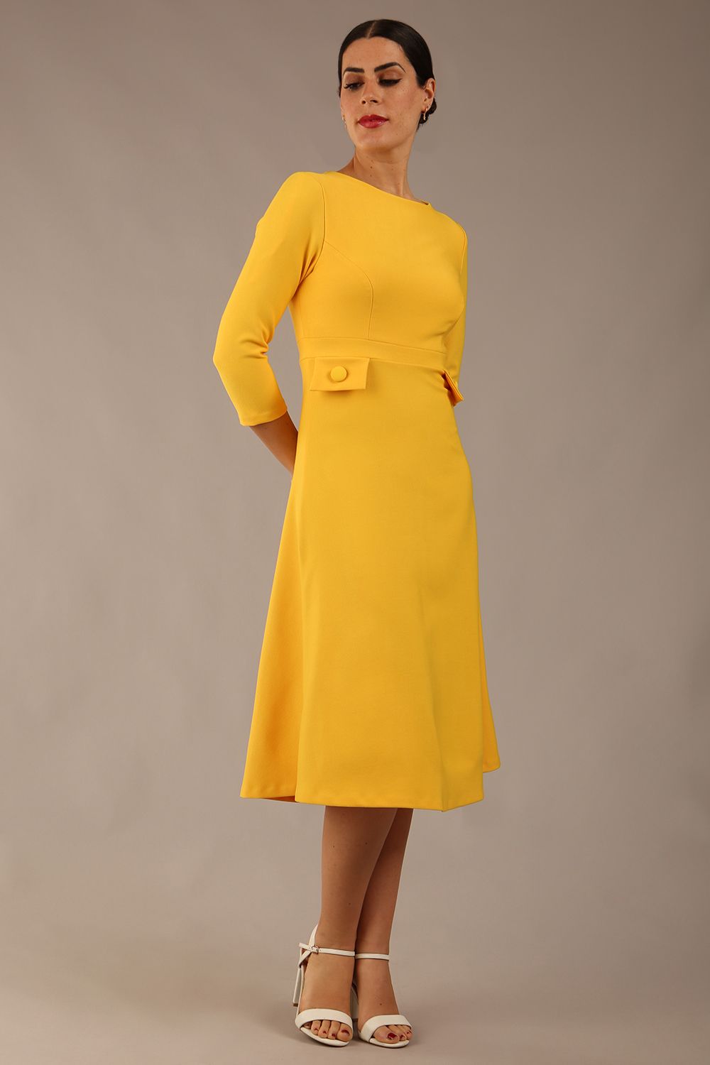 Model wearing diva catwalk Gresham 3/4 Sleeve Knee Length A-Line Dress in Daffodil Yellow side